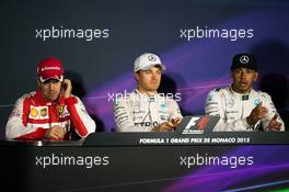 The FIA Press Conference (L to R): Sebastian Vettel (GER) Ferrari, second; Nico Rosberg (GER) Mercedes AMG F1, race winner; Lewis Hamilton (GBR) Mercedes AMG F1, third. 24.05.2015. Formula 1 World Championship, Rd 6, Monaco Grand Prix, Monte Carlo, Monaco, Race Day.