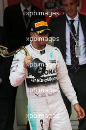 Lewis Hamilton (GBR) Mercedes AMG F1 celebrates his third position on the podium. 24.05.2015. Formula 1 World Championship, Rd 6, Monaco Grand Prix, Monte Carlo, Monaco, Race Day.