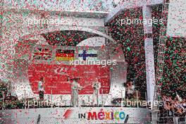 Lewis Hamilton (GBR) Mercedes AMG F1 celebrates his second position on the podium. 01.11.2015. Formula 1 World Championship, Rd 17, Mexican Grand Prix, Mexixo City, Mexico, Race Day.