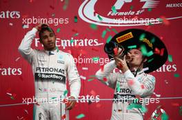 2nd place Lewis Hamilton (GBR) Mercedes AMG F1 with 1st place Nico Rosberg (GER) Mercedes AMG F1 W06. 01.11.2015. Formula 1 World Championship, Rd 17, Mexican Grand Prix, Mexixo City, Mexico, Race Day.