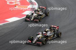 Romain Grosjean (FRA) Lotus F1 E23 and Pastor Maldonado (VEN) Lotus F1 E23 at the end of the race. 01.11.2015. Formula 1 World Championship, Rd 17, Mexican Grand Prix, Mexixo City, Mexico, Race Day.