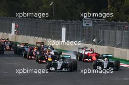 Nico Rosberg (GER) Mercedes AMG F1 W06 leads team mate Lewis Hamilton (GBR) Mercedes AMG F1 W06 at the start of the race. 01.11.2015. Formula 1 World Championship, Rd 17, Mexican Grand Prix, Mexixo City, Mexico, Race Day.