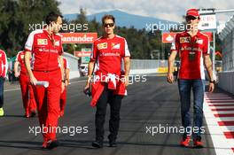 Sebastian Vettel (GER) Ferrari and Esteban Gutierrez (MEX) Ferrari Test and Reserve Driver walk the circuit. 29.10.2015. Formula 1 World Championship, Rd 17, Mexican Grand Prix, Mexixo City, Mexico, Preparation Day.