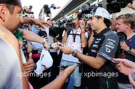 Sergio Perez (MEX) Sahara Force India F1 signs autographs for the fans. 29.10.2015. Formula 1 World Championship, Rd 17, Mexican Grand Prix, Mexixo City, Mexico, Preparation Day.