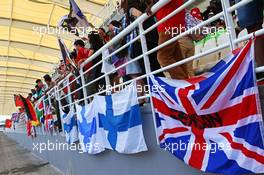 Fans and flags in the grandstand. 29.03.2015. Formula 1 World Championship, Rd 2, Malaysian Grand Prix, Sepang, Malaysia, Sunday.