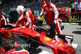 Sebastian Vettel (GER) Ferrari SF15-T on the grid. 29.03.2015. Formula 1 World Championship, Rd 2, Malaysian Grand Prix, Sepang, Malaysia, Sunday.