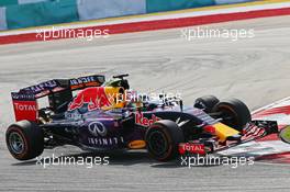 Daniil Kvyat (RUS) Red Bull Racing RB11 and Nico Hulkenberg (GER) Sahara Force India F1 VJM08 collide. 29.03.2015. Formula 1 World Championship, Rd 2, Malaysian Grand Prix, Sepang, Malaysia, Sunday.