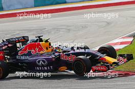 Daniil Kvyat (RUS) Red Bull Racing RB11 and Nico Hulkenberg (GER) Sahara Force India F1 VJM08 collide. 29.03.2015. Formula 1 World Championship, Rd 2, Malaysian Grand Prix, Sepang, Malaysia, Sunday.