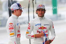 (L to R): Max Verstappen (NLD) Scuderia Toro Rosso with team mate Carlos Sainz Jr (ESP) Scuderia Toro Rosso. 28.03.2015. Formula 1 World Championship, Rd 2, Malaysian Grand Prix, Sepang, Malaysia, Saturday.
