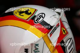 The helmet of Sebastian Vettel (GER) Ferrari. 28.03.2015. Formula 1 World Championship, Rd 2, Malaysian Grand Prix, Sepang, Malaysia, Saturday.