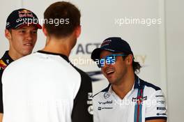 (L to R): Daniil Kvyat (RUS) Red Bull Racing with Jenson Button (GBR) McLaren and Felipe Massa (BRA) Williams on the drivers parade. 29.03.2015. Formula 1 World Championship, Rd 2, Malaysian Grand Prix, Sepang, Malaysia, Sunday.