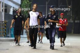 Daniel Ricciardo (AUS), Red Bull Racing and Jenson Button (GBR), McLaren Honda  18.09.2015. Formula 1 World Championship, Rd 13, Singapore Grand Prix, Singapore, Singapore, Practice Day.