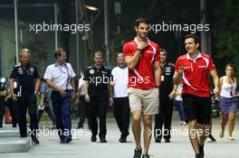 (L to R): Alexander Rossi (USA) Manor Marussia F1 Team with Fabio Leimer (SUI) Manor Marussia F1 Team Test and Reserve Driver. 18.09.2015. Formula 1 World Championship, Rd 13, Singapore Grand Prix, Singapore, Singapore, Practice Day.