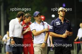 (L to R): Felipe Massa (BRA) Williams with Felipe Nasr (BRA) Sauber F1 Team. 18.09.2015. Formula 1 World Championship, Rd 13, Singapore Grand Prix, Singapore, Singapore, Practice Day.