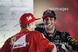 The podium (L to R): Kimi Raikkonen (FIN) Ferrari with Daniel Ricciardo (AUS) Red Bull Racing. 20.09.2015. Formula 1 World Championship, Rd 13, Singapore Grand Prix, Singapore, Singapore, Race Day.