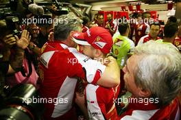 Race winner Sebastian Vettel (GER) Ferrari celebrates with Maurizio Arrivabene (ITA) Ferrari Team Principal. 20.09.2015. Formula 1 World Championship, Rd 13, Singapore Grand Prix, Singapore, Singapore, Race Day.