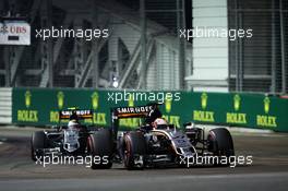 Nico Hulkenberg (GER) Sahara Force India F1 VJM08 leads team mate Sergio Perez (MEX) Sahara Force India F1 VJM08. 20.09.2015. Formula 1 World Championship, Rd 13, Singapore Grand Prix, Singapore, Singapore, Race Day.