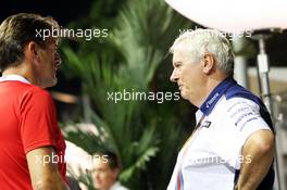 (L to R): Graeme Lowdon (GBR) Manor Marussia F1 Team Chief Executive Officer with Pat Symonds (GBR) Williams Chief Technical Officer. 19.09.2015. Formula 1 World Championship, Rd 13, Singapore Grand Prix, Singapore, Singapore, Qualifying Day.