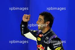 Daniel Ricciardo (AUS) Red Bull Racing celebrates his second position in qualifying parc ferme. 19.09.2015. Formula 1 World Championship, Rd 13, Singapore Grand Prix, Singapore, Singapore, Qualifying Day.