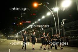 Jolyon Palmer (GBR) Lotus F1 Team Test and Reserve Driver and Romain Grosjean (FRA) Lotus F1 Team walk the circuit. 17.09.2015. Formula 1 World Championship, Rd 13, Singapore Grand Prix, Singapore, Singapore, Preparation Day.