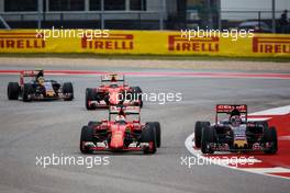 Sebastian Vettel (GER) Ferrari SF15-T and Max Verstappen (NLD) Scuderia Toro Rosso STR10 battle for position. 25.10.2015. Formula 1 World Championship, Rd 16, United States Grand Prix, Austin, Texas, USA, Race Day.