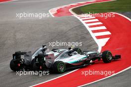 (L to R): Lewis Hamilton (GBR) Mercedes AMG F1 W06 and team mate Nico Rosberg (GER) Mercedes AMG F1 W06 battle for position at the start of the race. 25.10.2015. Formula 1 World Championship, Rd 16, United States Grand Prix, Austin, Texas, USA, Race Day.