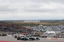 (L to R): Nico Rosberg (GER) Mercedes AMG F1 W06 and team mate Lewis Hamilton (GBR) Mercedes AMG F1 W06 battle for position at the start of the race. 25.10.2015. Formula 1 World Championship, Rd 16, United States Grand Prix, Austin, Texas, USA, Race Day.