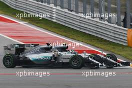 Lewis Hamilton (GBR) Mercedes AMG F1 W06 and team mate Nico Rosberg (GER) Mercedes AMG F1 W06 battle for position. 25.10.2015. Formula 1 World Championship, Rd 16, United States Grand Prix, Austin, Texas, USA, Race Day.