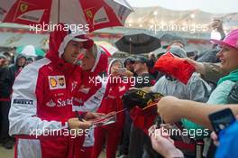 Sebastian Vettel (GER) Ferrari signs autographs for the fans. 24.10.2015. Formula 1 World Championship, Rd 16, United States Grand Prix, Austin, Texas, USA, Qualifying Day.
