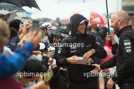 Jenson Button (GBR) McLaren signs autographs for the fans. 24.10.2015. Formula 1 World Championship, Rd 16, United States Grand Prix, Austin, Texas, USA, Qualifying Day.