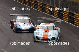 Dylan Derdaele (BEL) Gulf Racing JP Porsche 997 GT3R and Vutthikorn Inthraphuvasak (THA) Est Cola Racing Team Porsche 997 GT3R 21.11.2015. FIA GT Worldcup, Macau, China