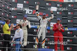 03.05.2015 - Race 2, 1st position Stefano Comini (SUI) SEAT Le&#xf3;n, Target Competition, 2nd position Michel Nykj&#xe6;r (DEN) SEAT Le&#xf3;n, Target Competition and 3rd position Andrea Belicchi (ITA) SEAT Le&#xf3;n, Target Competition 02-03.05.2015 TCR International Series, Valencia, Spain