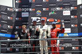 Race 2, 1st position Michel Nykjaer (DEN) SEAT Leon, Target Competition, 2nd position Kevin Gleason (USA) Honda Civic TCR, West Coast Racing and 3rd position Jordi Gene (ESP) SEAT Leon, Team Craft-Bamboo LUKOIL 10.05.2015. TCR International Series, Rd 4, Portimao, Portugal Sunday.