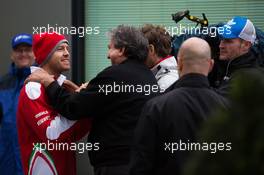 (L to R): Sebastian Vettel (GER) Ferrari with Pasquale Lattuneddu (ITA) of the FOM. 18.03.2016. Formula 1 World Championship, Rd 1, Australian Grand Prix, Albert Park, Melbourne, Australia, Practice Day.