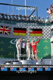 The podium (L to R): Lewis Hamilton (GBR) Mercedes AMG F1, second; Nico Rosberg (GER) Mercedes AMG F1, race winner; Sebastian Vettel (GER) Ferrari, third. 20.03.2016. Formula 1 World Championship, Rd 1, Australian Grand Prix, Albert Park, Melbourne, Australia, Race Day.