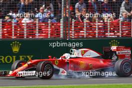 Sebastian Vettel (GER) Ferrari SF16-H locks up under braking. 19.03.2016. Formula 1 World Championship, Rd 1, Australian Grand Prix, Albert Park, Melbourne, Australia, Qualifying Day.