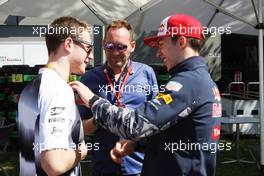 (L to R): Stoffel Vandoorne (BEL) McLaren Test and Reserve Driver with Frank Montangy (FRA) Canal+ TV Presenter and Pierre Gasly (FRA) Red Bull Racing Test Driver. 20.03.2016. Formula 1 World Championship, Rd 1, Australian Grand Prix, Albert Park, Melbourne, Australia, Race Day.