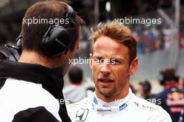 Jenson Button (GBR) McLaren on the grid. 03.07.2016. Formula 1 World Championship, Rd 9, Austrian Grand Prix, Spielberg, Austria, Race Day.