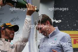 Race winner Lewis Hamilton (GBR) Mercedes AMG F1 celebrates on the podium with James Vowles (GBR) Mercedes AMG F1 Chief Strategist. 03.07.2016. Formula 1 World Championship, Rd 9, Austrian Grand Prix, Spielberg, Austria, Race Day.