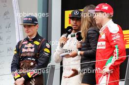 The podium (L to R): Max Verstappen (NLD) Red Bull Racing, second; Lewis Hamilton (GBR) Mercedes AMG F1, race winner; Noemi de Miguel (ESP) TV Presenter; Kimi Raikkonen (FIN) Ferrari, third. 03.07.2016. Formula 1 World Championship, Rd 9, Austrian Grand Prix, Spielberg, Austria, Race Day.