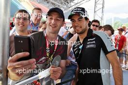 Sergio Perez (MEX) Sahara Force India F1 with fans. 30.06.2016. Formula 1 World Championship, Rd 9, Austrian Grand Prix, Spielberg, Austria, Preparation Day.