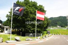 Austrian and F1 flags. 30.06.2016. Formula 1 World Championship, Rd 9, Austrian Grand Prix, Spielberg, Austria, Preparation Day.