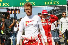 Sebastian Vettel (GER) Ferrari on the grid. 28.08.2016. Formula 1 World Championship, Rd 13, Belgian Grand Prix, Spa Francorchamps, Belgium, Race Day.