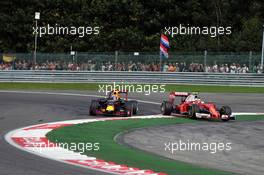 Max Verstappen (NLD) Red Bull Racing RB12 and Kimi Raikkonen (FIN) Ferrari SF16-H battle for position. 28.08.2016. Formula 1 World Championship, Rd 13, Belgian Grand Prix, Spa Francorchamps, Belgium, Race Day.