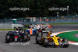Kevin Magnussen (DEN) Renault Sport F1 Team RS16 leads Jenson Button (GBR) McLaren MP4-31 as he is hit by Pascal Wehrlein (GER) Manor Racing MRT05 at the start of the race. 28.08.2016. Formula 1 World Championship, Rd 13, Belgian Grand Prix, Spa Francorchamps, Belgium, Race Day.
