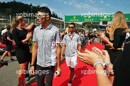 Pascal Wehrlein (GER) Manor Racing and team mate Esteban Ocon (FRA) Manor Racing on the drivers parade. 28.08.2016. Formula 1 World Championship, Rd 13, Belgian Grand Prix, Spa Francorchamps, Belgium, Race Day.
