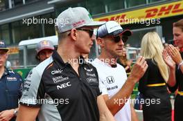 (L to R): Nico Hulkenberg (GER) Sahara Force India F1 and Jenson Button (GBR) McLaren on the drivers parade. 28.08.2016. Formula 1 World Championship, Rd 13, Belgian Grand Prix, Spa Francorchamps, Belgium, Race Day.