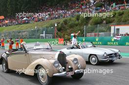 (L to R): Fernando Alonso (ESP) McLaren and Nico Rosberg (GER) Mercedes AMG F1 on the drivers parade. 28.08.2016. Formula 1 World Championship, Rd 13, Belgian Grand Prix, Spa Francorchamps, Belgium, Race Day.