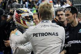 Race winner Nico Rosberg (GER) Mercedes AMG F1 celebrates in parc ferme with third placed team mate Lewis Hamilton (GBR) Mercedes AMG F1. 03.04.2016. Formula 1 World Championship, Rd 2, Bahrain Grand Prix, Sakhir, Bahrain, Race Day.