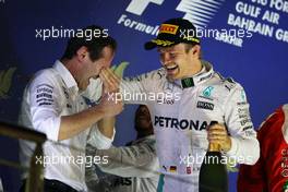 Race winner Nico Rosberg (GER) Mercedes AMG F1 celebrates on the podium with Aldo Costa (ITA) Mercedes AMG F1 Engineering Director. 03.04.2016. Formula 1 World Championship, Rd 2, Bahrain Grand Prix, Sakhir, Bahrain, Race Day.